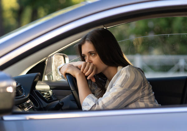 Young woman looking upset after being intercepted by the Police in Geelong and charged with a traffic offence