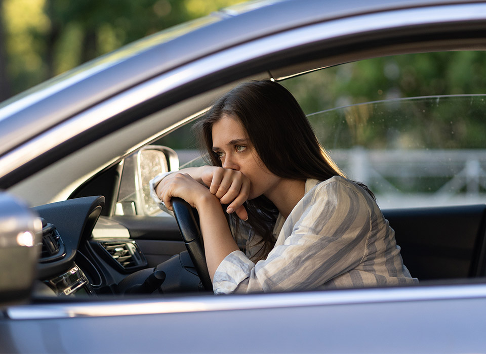 Young woman looking upset after being charged with a crime in Geelong